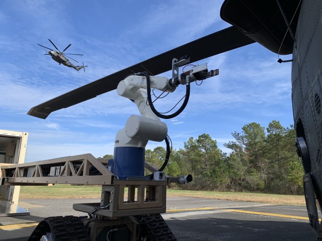 The Autonomous and Robotic Remote Refueling Point (AR3P) ruggedized system delivers fuel as a ground based autonomous unmanned robotic arm refueling capability system that is rail mounted and deployed from a standardized shipping container. 