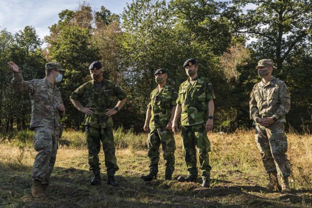 Swedish soldiers, assigned to the Air Defence Regiment, visit U.S. Soldiers assigned to the 5th Battalion, 7th Air Defense Artillery Regiment, 10th Army Air and Missile Defense Command, in Baumholder training Area, Germany on Aug. 18-20. The Swedish Armed Forces visit was to observe  training and to collaborate with the U.S. air defense artillery unit, and to discuss future training that may take place in the European theater.