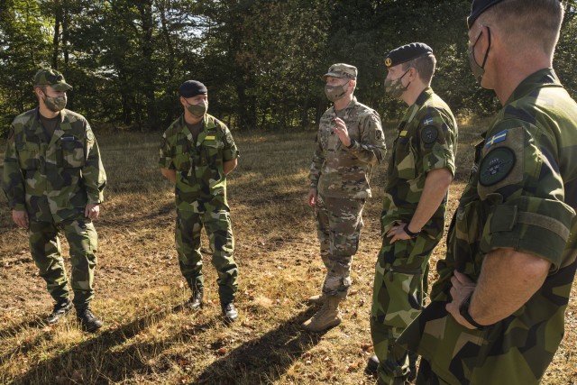 Swedish soldiers, assigned to the Air Defence Regiment, visit U.S. Soldiers assigned to the 5th Battalion, 7th Air Defense Artillery Regiment, 10th Army Air and Missile Defense Command, in Baumholder training Area, Germany on Aug. 18-20. The Swedish Armed Forces visit was to observe  training and to collaborate with the U.S. air defense artillery unit, and to discuss future training that may take place in the European theater.