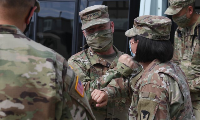 The Commanding General of the Army Materiel Command (AMC), Gen. Edward M. Daly greets Soldiers in the 1st Cavalry Division Sustainment Brigade’s Operation Pegasus Harvest motor pool at Fort Hood, TX, July 30. The operation targets equipment readiness by reducing excess and costs. (U.S. Army photo by Pvt. Brayton Daniel)