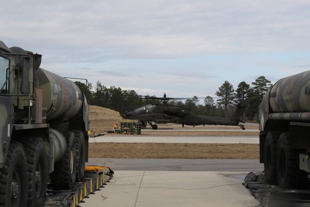 A U.S. Army AH-64D Apache Longbow prepares to take off during an aerial gunnery range exercise at Fort Bragg, North Carolina, Jan. 27, 2020. The more than 1,100-acre range has over 460 targets controlled by a team in the observation tower. (U.S. Army photo by Pfc. Joshua Cowden, 22nd Mobile Public Affairs Detachment)