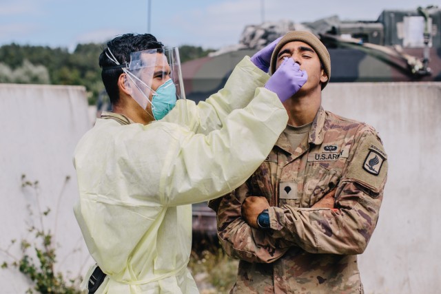 A U.S. Army medic paratrooper assigned to 1st Battalion, 503rd Infantry Regiment, 173rd Airborne Brigade swabs a soldier for COVID-19 during a 100% surveillance testing of the brigade in Hohenfels Training Area, Germany, Aug. 20, 2020 during Exercise Saber Junction 20.

The 173rd Airborne Brigade is the U.S. Army's Contingency Response Force in Europe, providing rapidly deployable forces to the United States Europe, Africa and Central Command areas of responsibility. Forward deployed across Italy and Germany, the brigade routinely trains alongside NATO allies and partners to build partnerships and strengthen the alliance.

(U.S. Army photo by Spc. Ryan Lucas)