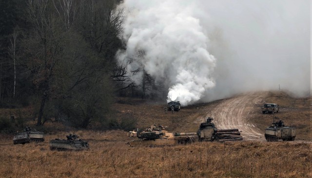 1st Battalion, 8th Cavalry Regiment, 2nd Armored Brigade Combat Team, 1st Cavalry Division, M1A2 Abrams tanks engages the enemy during force on force portion of the training exercise Combined Resolve XIII at the Joint Multinational Readiness...