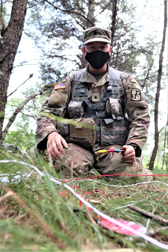 ROTC Cadet Mason Boucher with the University of Wisconsin-Stevens Point ROTC program and other cadets participate in field training Aug. 13, 2020, at Fort McCoy, Wis. Dozens of ROTC cadets from seven universities trained at Fort McCoy for 10 days...