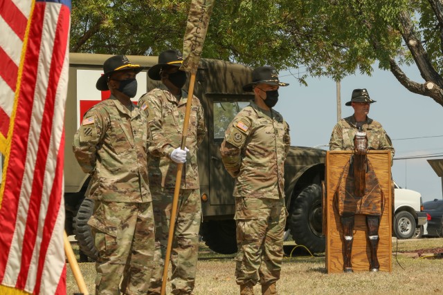 The 553rd Combat Sustainment Support Battalion Commander, Lt. Col. Justin Redfern, gives words of encouragement to the 154th Composite Truck Company Command Team and their Soldiers during the units casing ceremony on Fort Hood, Texas, August 18,...