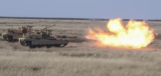 Staff Sgt. Robert Gill, with 1st Battalion, 5th Cavalry Regiment, 2nd Armored Brigade Combat Team, 1st Cavlary Division zeroes his M1 Abrams before conducting a Combined Arms Live Fire Exercise (CALFEX) in Galati, Romania on Feb. 17, 2020. Gill is...