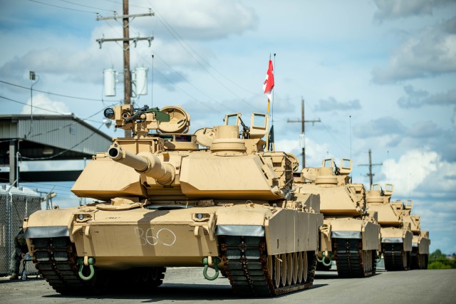 Troopers assigned to Bravo Company, 3rd Battalion, 8th Cavalry Regiment, 3rd Armored Brigade Combat Team (3ABCT), 1st Cavalry Division, stage the first set of new M1A2C (SEP v.3) Abrams Tanks at Fort Hood, Texas, July 21, 2020. The modernization of the Greywolf brigade, with the addition of receiving the new Abrams tanks, makes 3ABCT the most lethal and agile armored brigade in the Army. (U.S. Army photo by Sgt. Calab Franklin)