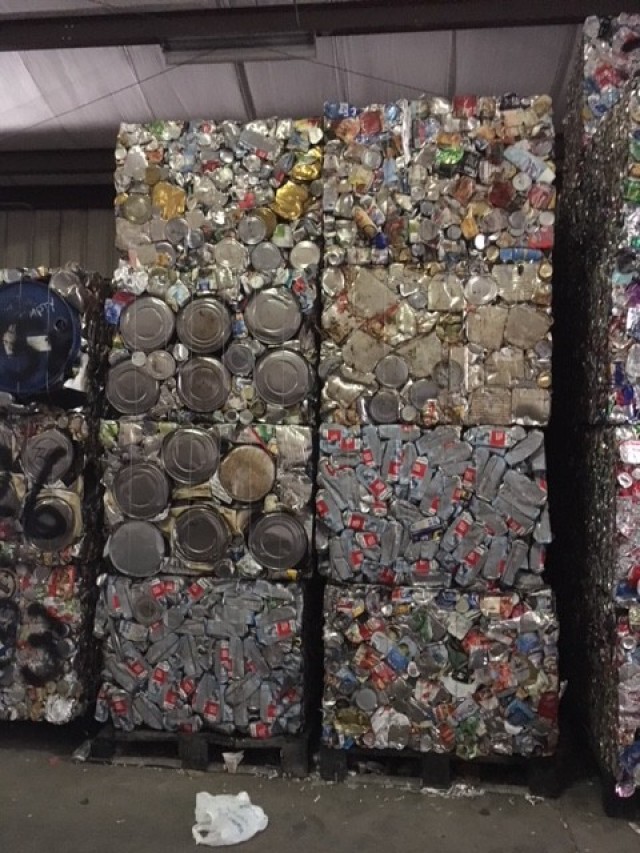 Fort Sill Recycle Center bales of steel cans, along with separate bales of aluminum beverage cans, await vendor pickup and delivery to a processing facility. As steel and aluminum cans be recycled almost indefinitely, these cans will be melted...