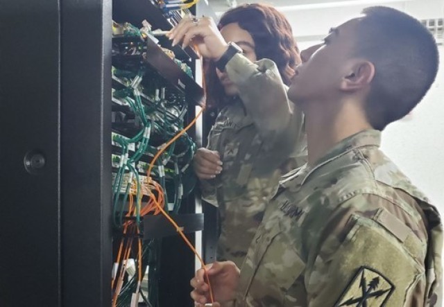 Network Support personnel of the USANEC – Camp Zama team install network devices at Hardy Barracks in Tokyo, Japan, in January of 2020.