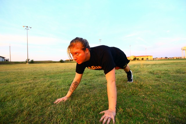 Spc. Chandler Heath, Fort Sill Medical Department Activity, performs pushups Aug. 21, 2020, at the track outside Rinehart Fitness Center. Pregnancy/Postpartum Physical Training workouts are offered Mondays through Fridays, with pool physical training on Fridays.