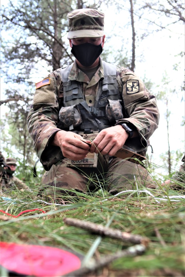 ROTC Cadet Mason Boucher with the University of Wisconsin-Stevens Point ROTC program and other cadets participate in field training Aug. 13, 2020, at Fort McCoy, Wis. Dozens of ROTC cadets from seven universities trained at Fort McCoy for 10 days...