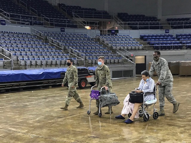 Louisiana National Guard Soldiers and Airmen assist citizens in Southwest Louisiana at the Burton Coliseum in Lake Charles before landfall of Hurricane Laura Aug. 26-27, 2020. More than 3,000 members of the Louisiana Guard were involved in...