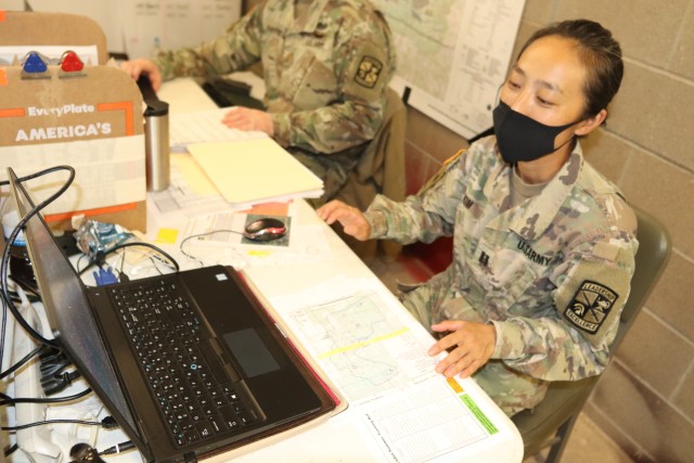 Capt. Hyeon Kim, who served as an operations officer with ROTC training at Fort McCoy in early August 2020, plans some training Aug. 13, 2020, in a building at the Combined Arms Collective Training Facility on South Post at Fort McCoy, Wis. Dozens...