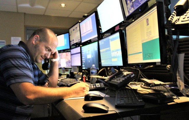 Aaron Demarte, public safety dispatcher with the Fort McCoy Directorate of Emergency Services (DES) 911 Communications/Security Center, processes a request Aug. 6, 2020, in the center at Fort McCoy, Wis. The center, also referred to as DES...