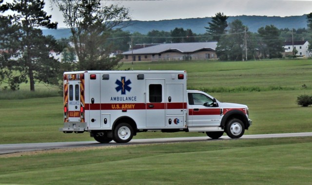 An ambulance and crew with the Directorate of Emergency Services Fire Department moves on the cantonment area July 9, 2020, after an emergency response at Fort McCoy, Wis. Fort McCoy fire and ambulance personnel maintain operations 24 hours a day,...