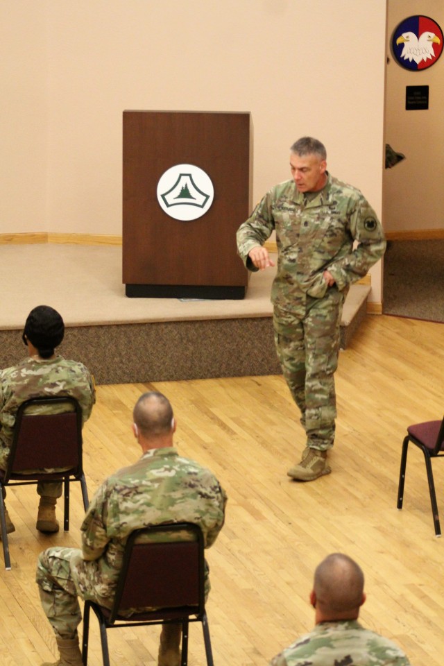 Command Sgt. Maj. Andrew Lombardo, who serves as the command sergeant major of the Army Reserve, talks with Soldiers on Aug. 28, 2020, in building 905 at Fort McCoy, Wis. The enlisted call was a specially coordinated event with social distancing and other safety measures in place. The event provided a chance for Soldiers to hear the latest updates from the leadership level of the Army Reserve and a chance for those same Soldiers to ask the enlisted leader any questions they may have. The call was part of a five-day visit by Lombardo where he visited with Reserve Soldiers training in the 78th Training Division Operation Ready Warrior as well as with Reserve Soldiers attending institutional training at Fort McCoy. Lombardo visited Fort McCoy’s Regional Training Site-Maintenance as well as the Fort McCoy Noncommissioned Officer Academy. The senior enlisted leader also visited with members of senior leadership throughout Fort McCoy. The Army Reserve of today can trace its roots as a "national" or federal Citizen-Soldier force that goes back more than a century. Over the years, with the crisis of a major war, the federal government mobilized large Citizen-Soldier forces and trained them for combat operations. Today, the Army Reserve has more than 200,000 Soldiers and Civilian employees and 2,000 units spread across 20 time zones. (U.S. Army Photo by Scott T. Sturkol, Public Affairs Office, Fort McCoy, Wis.)