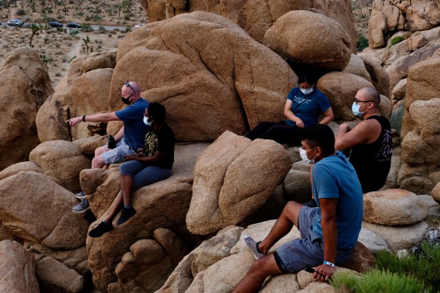 U.S. Air Force Maj. David Weller, pointing, leads a group of medical providers from COVID Theater Hospital-1 on a hike through Joshua Tree National Park, Calif., Aug. 21, 2020. As part of its commitment to resiliency, U.S. Army North deployed...