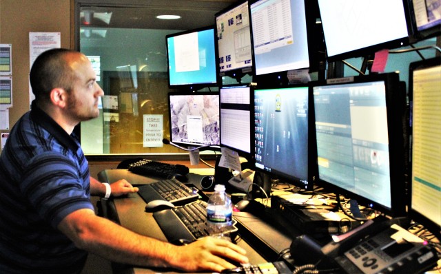 Aaron Demarte, public safety dispatcher with the Fort McCoy Directorate of Emergency Services (DES) 911 Communications/Security Center, processes a request Aug. 6, 2020, in the center at Fort McCoy, Wis. The center, also referred to as DES...
