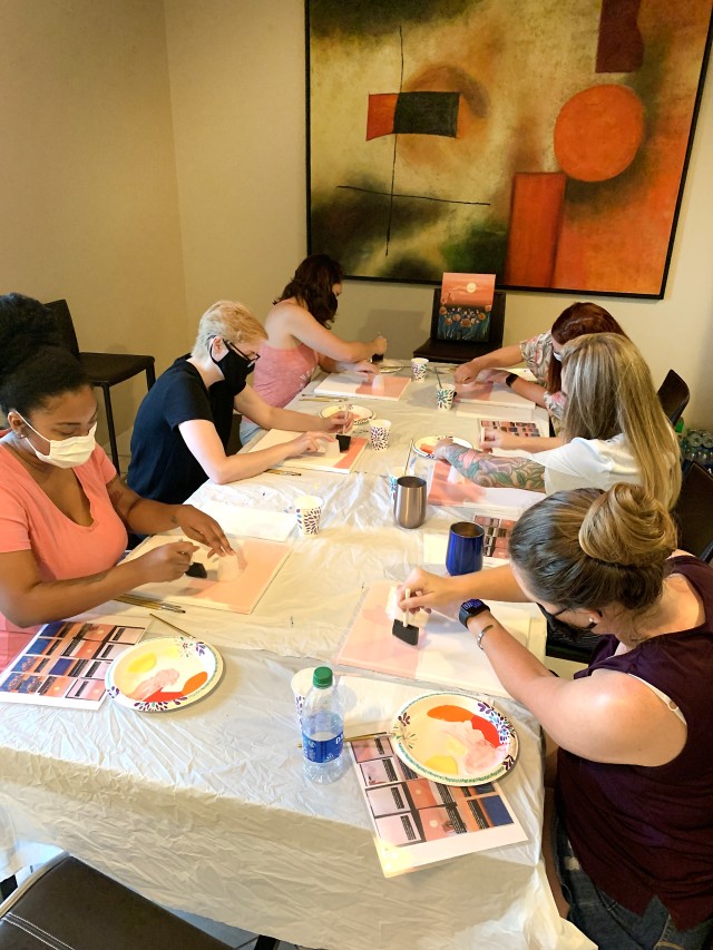 Members of COVID Theater Hospital-1, Travis Air Force Base, Calif., participate in a painting class taught by a U.S. Air Force behavioral health team, Stockton, Calif., Aug. 17, 2020. The behavioral health team provides classes to help those...