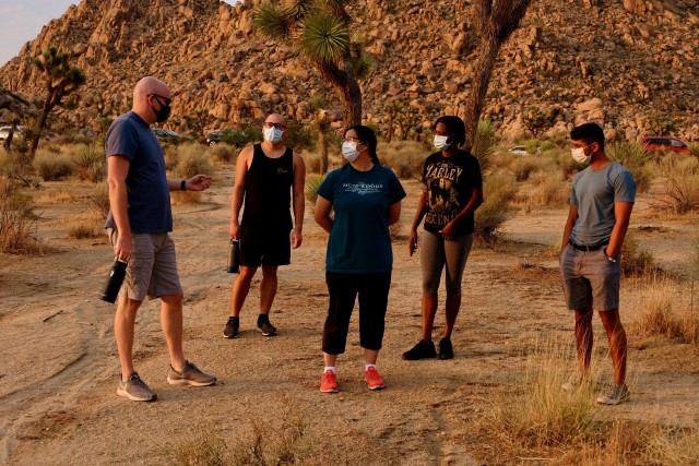 U.S. Air Force Maj. David Weller, left, leads a group of medical providers from COVID Theater Hospital-1 on a hike through Joshua Tree National Park, Calif., Aug. 21, 2020. As part of its commitment to resiliency, U.S. Army North deployed several...
