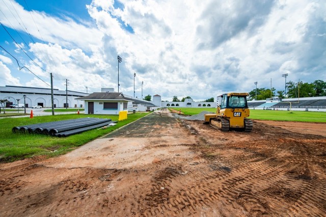 FORT BENNING, Ga. – At Doughboy Stadium here Aug. 28, work has begun on extending the length of the heavily used running track, as well as giving it a new rubberized surface and installing a drainage system to keep rainwater from pooling. The...