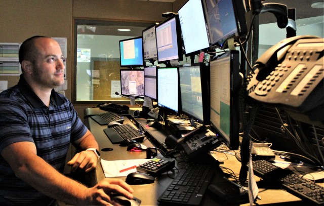 Aaron Demarte, public safety dispatcher with the Fort McCoy Directorate of Emergency Services (DES) 911 Communications/Security Center, processes a request Aug. 6, 2020, in the center at Fort McCoy, Wis. The center, also referred to as DES...