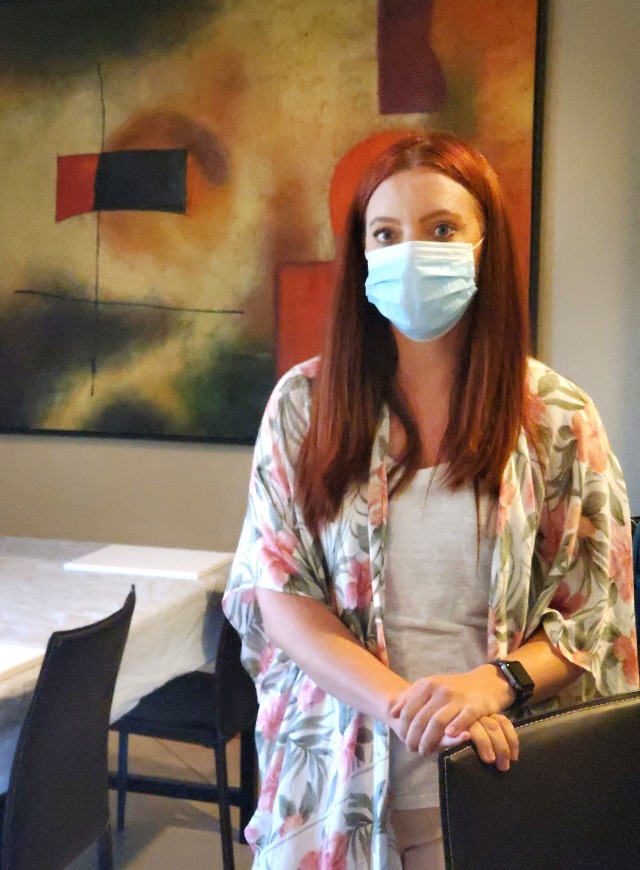 U.S. Air Force Maj. Chelsea Arnold, a clinical social worker and member of a behavioral health team providing support to COVID Theater Hospital-1, Travis Air Force Base, Calif., poses for a moment before her meditation class, Stockton, Calif.,...
