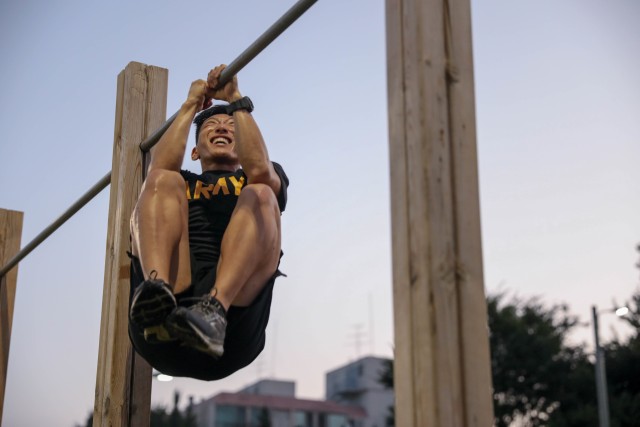 Spc. Hwui Yoo, 501st Military Intelligence Brigade, conducts a leg-tuck during the Army Combat Fitness Test stage of the United States Army Pacific Command Best Warrior Competition, Aug. 24, 2020, Camp Humphreys, Republic of Korea. The USARPAC BWC...