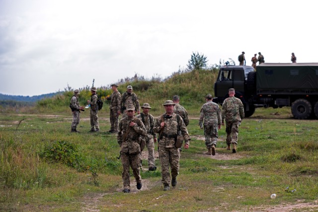 Maj. Lionel Gonzalez and Sgt. Maj. Michael Filipiak, Battalion Training Group officer and non-commissioned officer in charge with Task Force Illini, 33rd Infantry Brigade Combat Team, Illinois Army National Guard, mentored Ukraine Armed Forces...