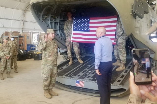 U.S. Army Spc. Daniel Rivera, a Michigan National Guard Soldier and CH-47 helicopter repairer deployed with Bravo Company, 628th Aviation Support Battalion, 28th Expeditionary Combat Aviation Brigade, takes the oath of allegiance during a...