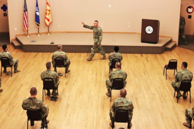 Command Sgt. Maj. Andrew Lombardo, who serves as the command sergeant major of the Army Reserve, talks with Soldiers on Aug. 28, 2020, in building 905 at Fort McCoy, Wis. The enlisted call was a specially coordinated event with social distancing...