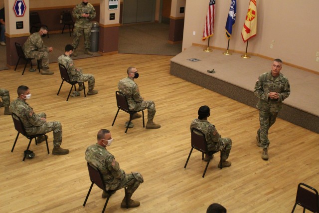 Command Sgt. Maj. Andrew Lombardo, who serves as the command sergeant major of the Army Reserve, talks with Soldiers on Aug. 28, 2020, in building 905 at Fort McCoy, Wis. The enlisted call was a specially coordinated event with social distancing...