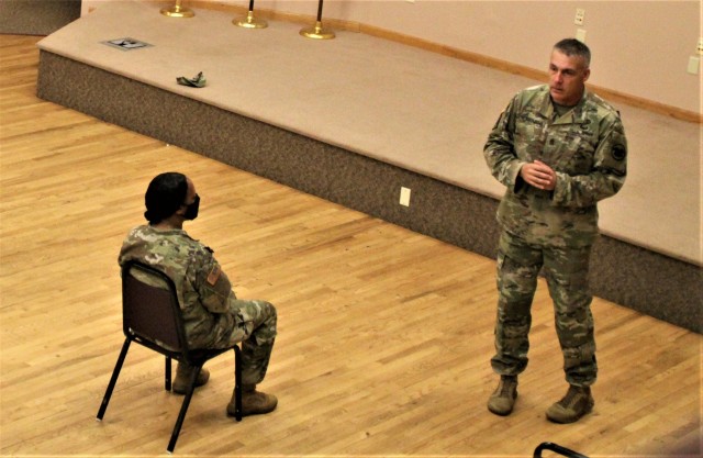 Command Sgt. Maj. Andrew Lombardo, who serves as the command sergeant major of the Army Reserve, talks with Soldiers on Aug. 28, 2020, in building 905 at Fort McCoy, Wis. The enlisted call was a specially coordinated event with social distancing...