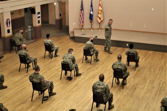 Command Sgt. Maj. Andrew Lombardo, who serves as the command sergeant major of the Army Reserve, talks with Soldiers on Aug. 28, 2020, in building 905 at Fort McCoy, Wis. The enlisted call was a specially coordinated event with social distancing...