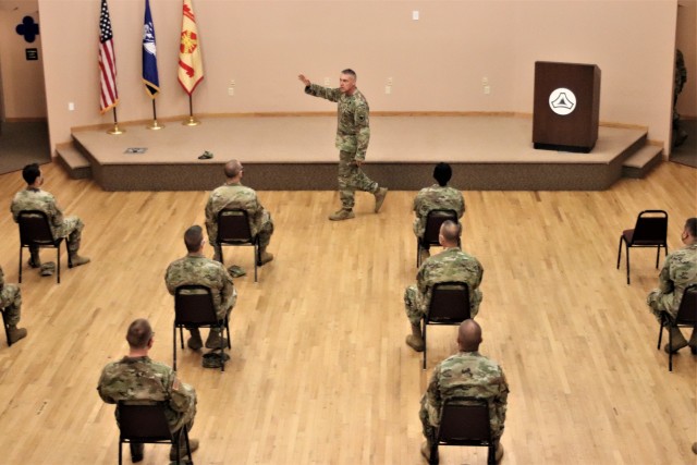 Command Sgt. Maj. Andrew Lombardo, who serves as the command sergeant major of the Army Reserve, talks with Soldiers on Aug. 28, 2020, in building 905 at Fort McCoy, Wis. The enlisted call was a specially coordinated event with social distancing...