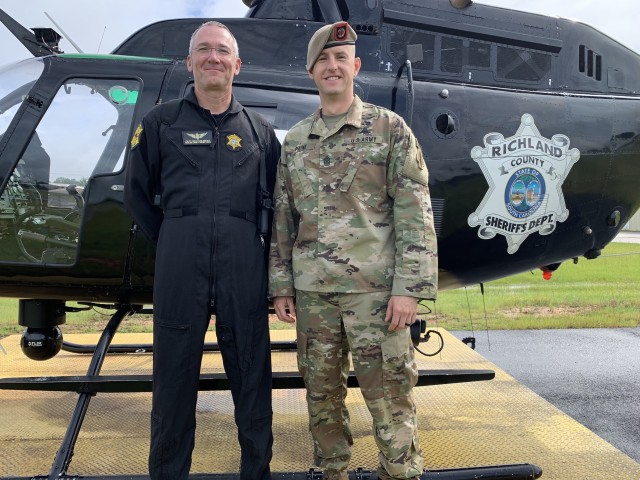 Sgt. Maj. Thomas &#34;Patrick&#34; Payne, right, poses for a photo with his father,  Drayton Shealy, a pilot and police officer for Richland County Sheriff&#39;s Dept. in South Carolina, June 25, 2020. Payne said he takes pride in being part of a...