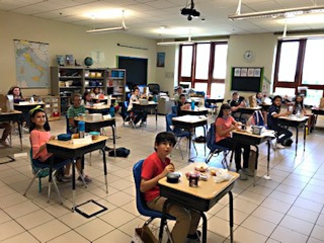 VICENZA - Vicenza Elementary School students attend the first day of school Aug. 24, following new safety requirements and precautionary measures put in place by the Department of Defense Education Activity to ensure that alongside educators they...