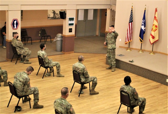 Command Sgt. Maj. Andrew Lombardo, who serves as the command sergeant major of the Army Reserve, talks with Soldiers on Aug. 28, 2020, in building 905 at Fort McCoy, Wis. The enlisted call was a specially coordinated event with social distancing...