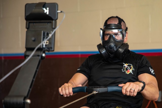 1st Sgt. Marc Dibernardo, Headquarters and Headquarters Company, 3rd Infantry Brigade Combat Team, 25th Infantry Division First Sergeant, rows 48,400 meters while wearing an M-50 Protective Mask in an effort to raise awareness for suicide prevention on Aug. 27, 2020 on Schofield Barracks, Hawaii. 
