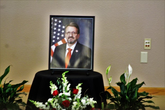 Fort McCoy community members and friends and family of James C. Hamilton III gathered for a socially distanced memorial service Aug. 14, 2020, in building 905 at Fort McCoy, Wis. Hamilton was the former director of the Directorate of Emergency...