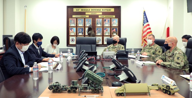 KYOGAMISAKI, Japan – Col. Matthew W. Dalton, 38th Air Defense Artillery Brigade commander, alongside acting Command Sgt. Maj. George S. Rupprecht, brigade senior enlisted advisor, and Maj. Blake Benedict, 14th Missile Defense Battery commander, meets with Masahiro Masuga, director-general, Kinki-Chubu Defense Bureau, and Lt. Col. Akiyasu Mine, 35th Aircraft Control and Warning Squadron, Japan Air Self-Defense Force, to discuss COVID-19 prevention measures, ways to improve information sharing, and a way-forward to enhance the U.S.-Japan alliance in the Kyotango Prefecture area during a visit to Kyogamisaki Communications Site Aug. 26.