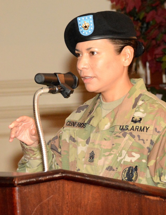 FORT LEE, VA. -- The new Logistics Noncommissioned Officer Academy commandant, Command Sgt. Maj. Marissa M. Cisneros, thanks her husband Daniel for being there for her throughout her career during the Change of Responsibility ceremony at the Lee...