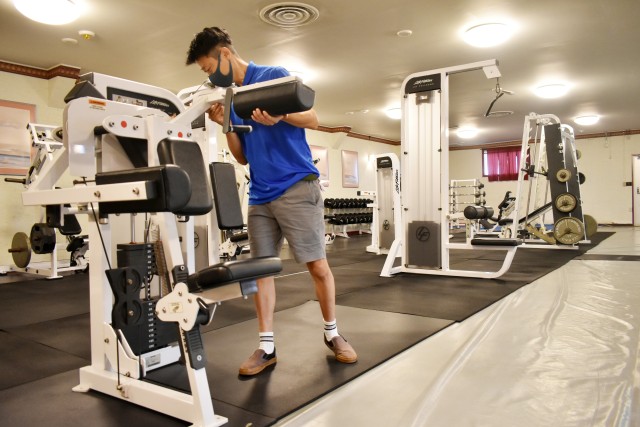Tomoyuki Suzuki, a maintenance handyman for Camp Zama’s Family and Morale, Welfare and Recreation, prepares equipment for patron use at the new site of the Sagami General Depot Gym on Sagami General Depot, Japan, Aug. 31.