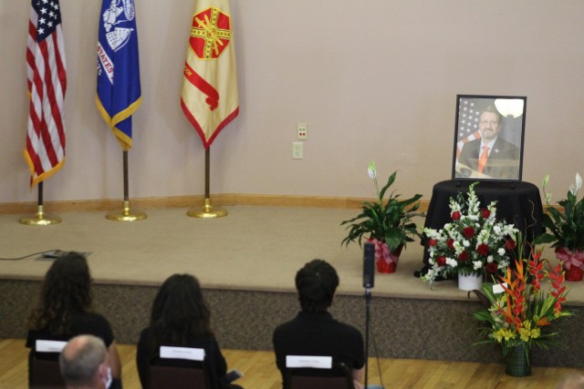 Fort McCoy community members and friends and family of James C. Hamilton III gathered for a socially distanced memorial service Aug. 14, 2020, in building 905 at Fort McCoy, Wis. Hamilton was the former director of the Directorate of Emergency...