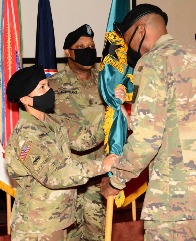 FORT LEE, VA. -- Command Sgt. Maj. Marissa M. Cisneros accepts her new role as the Logistics Noncommissioned Officer Academy commandant, after accepting the school colors from Brig. Gen. James M. Smith, 31st Chief of Transportation and interim ALU...