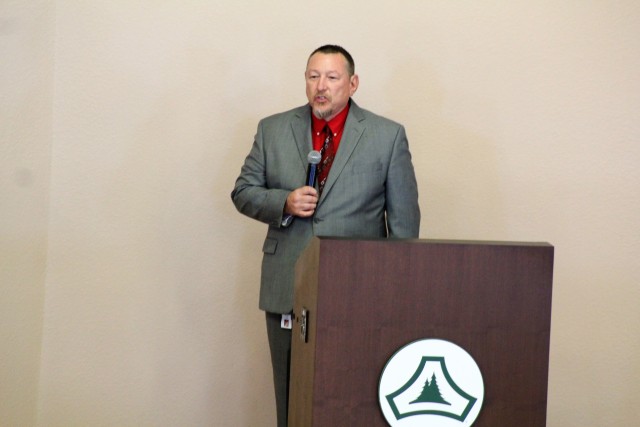 Mark Reaves, physical security chief for the Directorate of Emergency Services, as well as other Fort McCoy community members and friends and family of James C. Hamilton III gathered for a socially distanced memorial service Aug. 14, 2020, in...