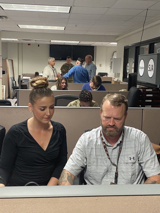 Jessica Ballard (left), Financial Readiness Program manager and Mike Buterbaugh, Mobilization Deployment and Stability Support Operations Program manager, split their time between the Warrior Operations Center and the Family Readiness Center to...