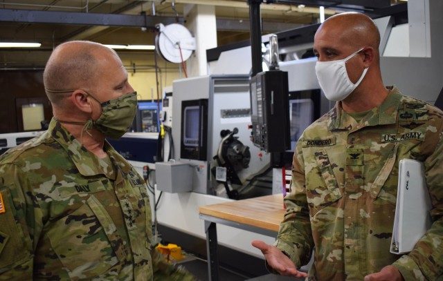 Col. Stephen Dondero (right), the commander of Crane Army Ammunition Activity, discusses Crane Army’s modernization strategy with Gen. Ed Daly (left), the commanding general of U. S. Army Materiel Command, during a visit Sept. 4. Crane Army is...