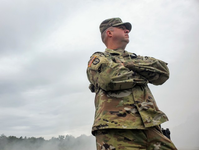 Master Sgt. Derek Fontaine, one of the two leads in charge of planning, organizing and executing the 2020 Army Reserve Best Warrior Competition, stands watch while Soldiers go through an evaluated lane at Fort McCoy, Wisconsin, Sept. 8, 2020. More...