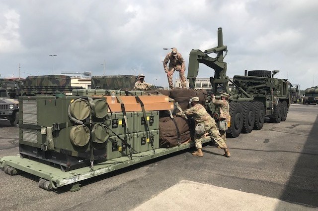 Soldiers assigned to the 563rd Medical Logistics Company's forward logistics element load field sets prior to executing convoy operations during a field training exercise, held Aug. 15-22 in South Korea. (U.S. Army photo by Staff Sgt. Erik V. Freeman)